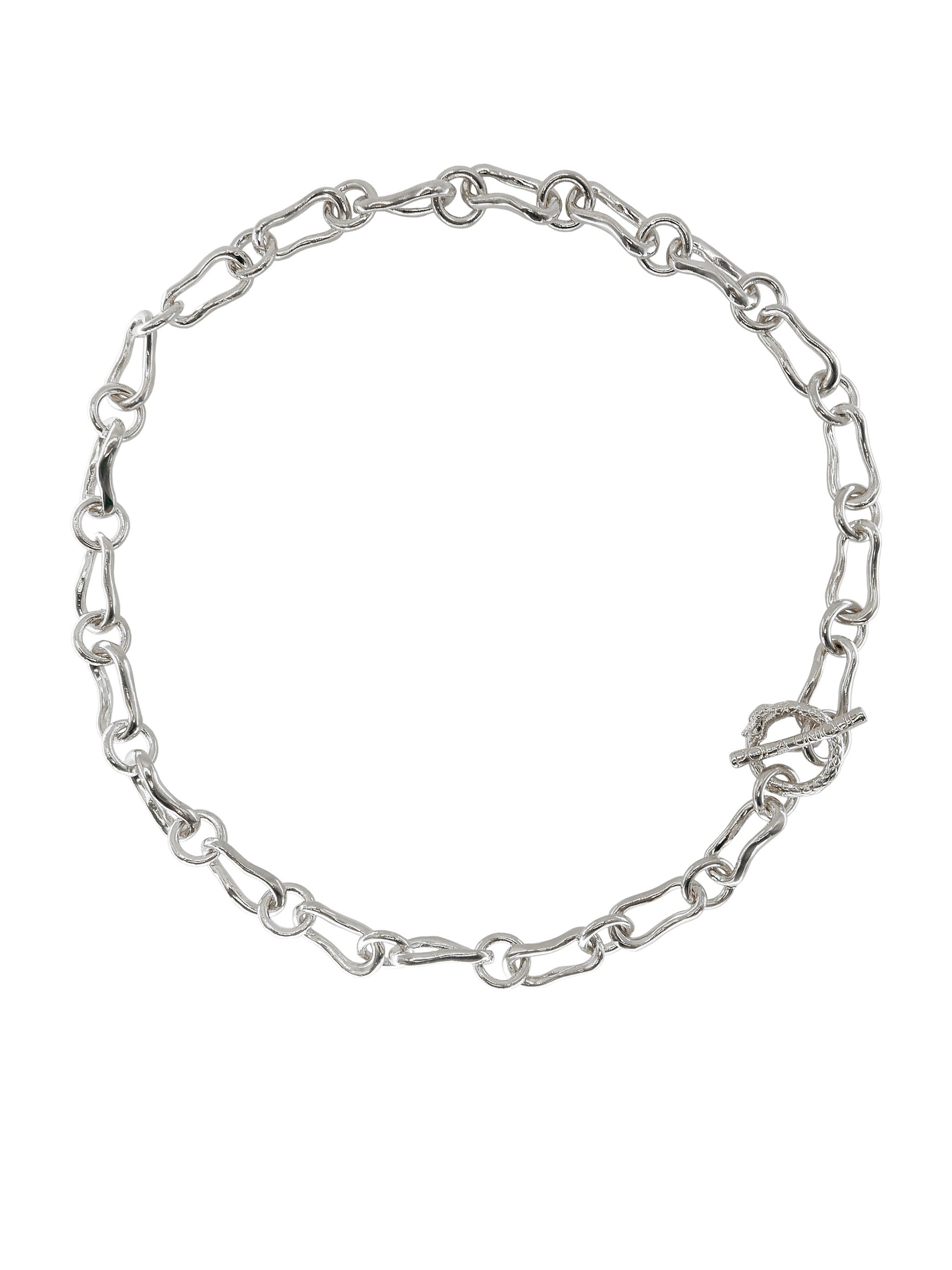 Ouroboros T-Bar Chain Necklace tells a story of Eternal Love and Infinite Power, symbolized by the mythic Ouroboros. Gender Neutral. Silver plated.