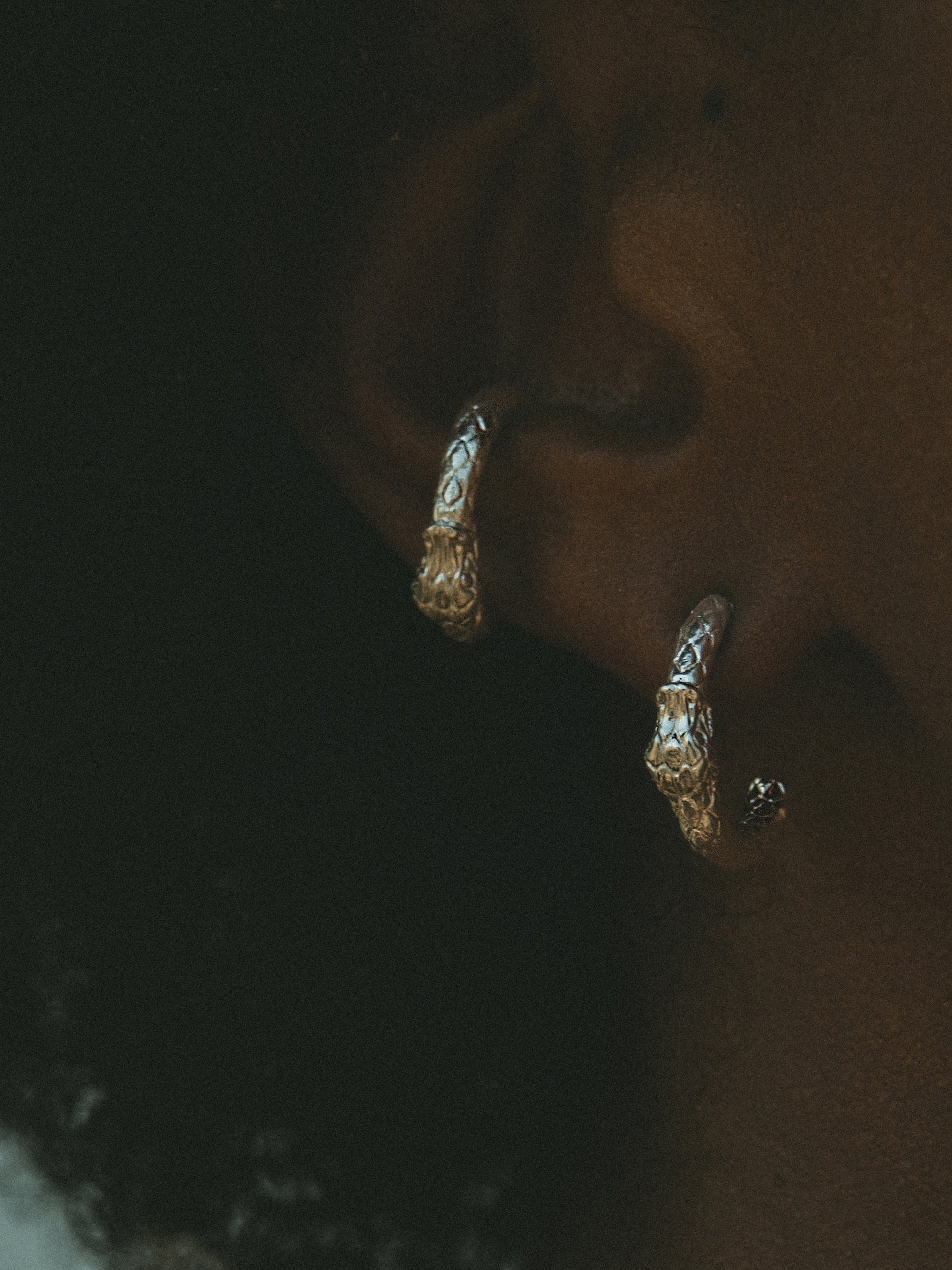 Ouroboros Mini Hoop Earrings. Inspired by the mythic Ouroboros, these earrings symbolize Eternal Love and Infinite Power. Sterling Silver. Gender Neutral