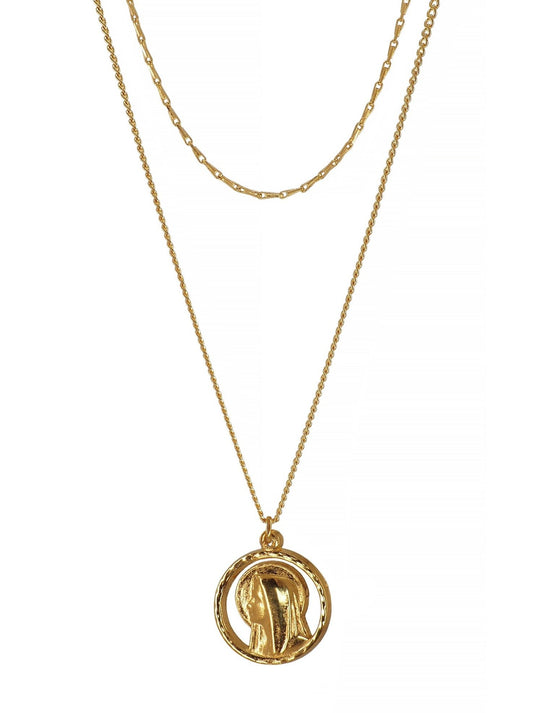 Bold and gorgeous two layered Necklace featuring a beautiful antique Our Lady of Lourdes pendant set on two dainty Brass chains.