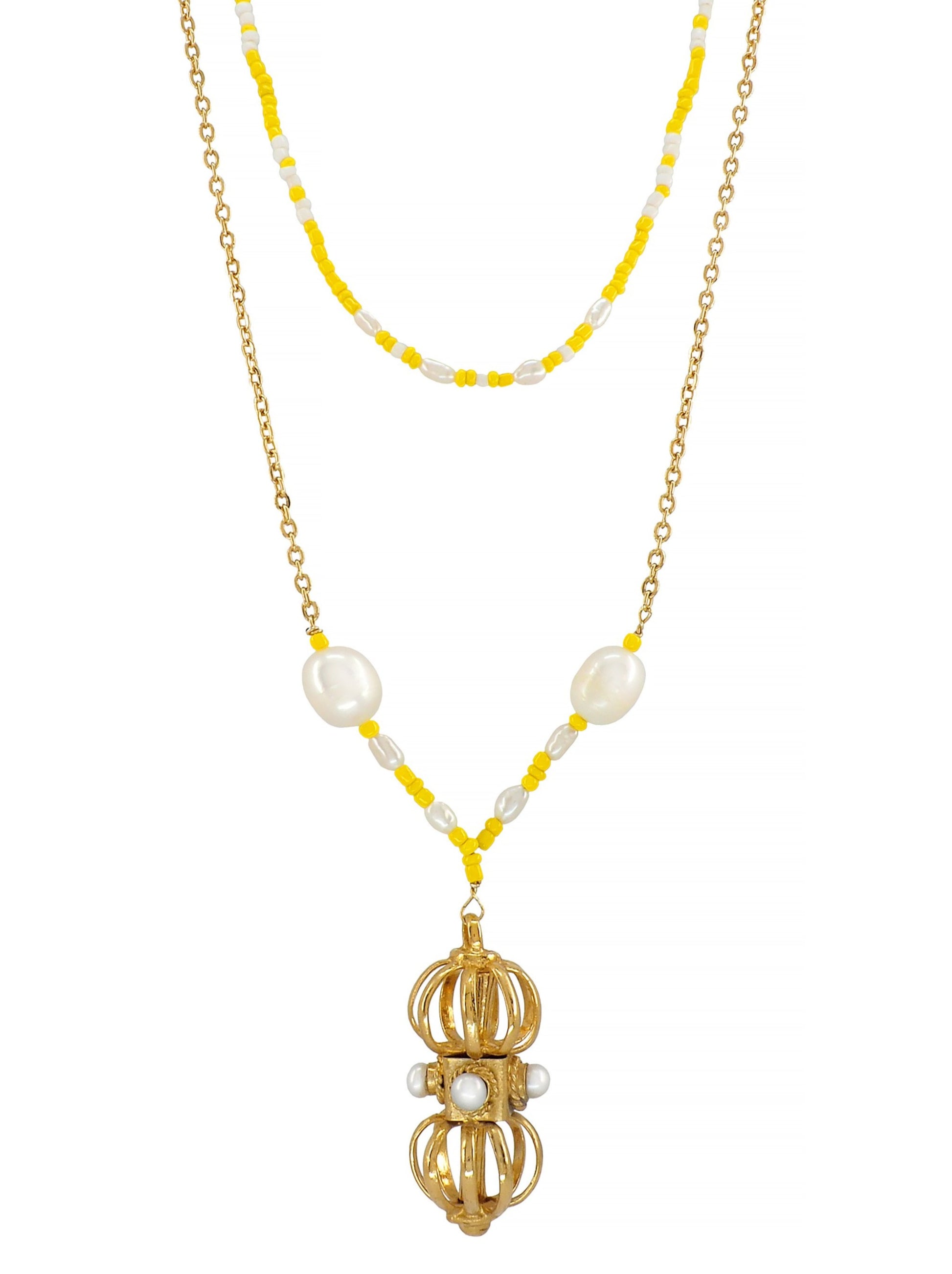 This beautiful Necklace is made with a gorgeous antique Dorje pendant bought in an old quaint little store in Thailand. 